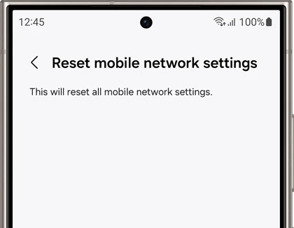 Screen of a Galaxy phone displaying a message 'Reset mobile network settings' with a note that this will reset all mobile network settings.